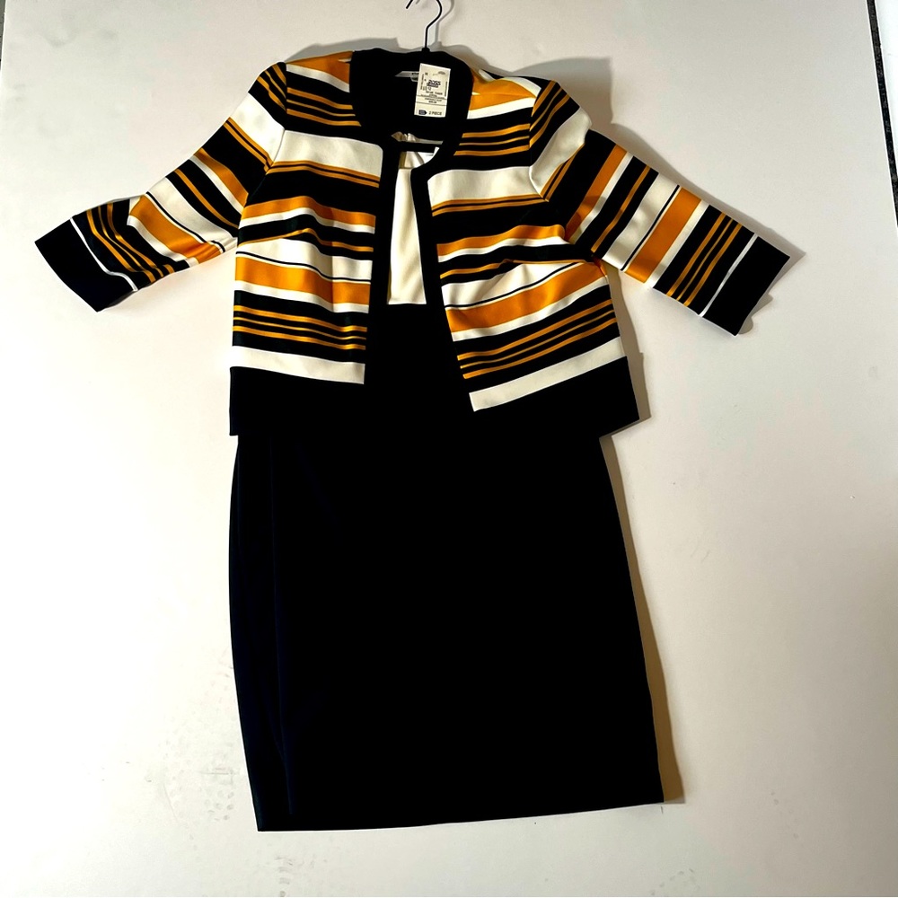 Two piece dress suit. Dress with jacket.